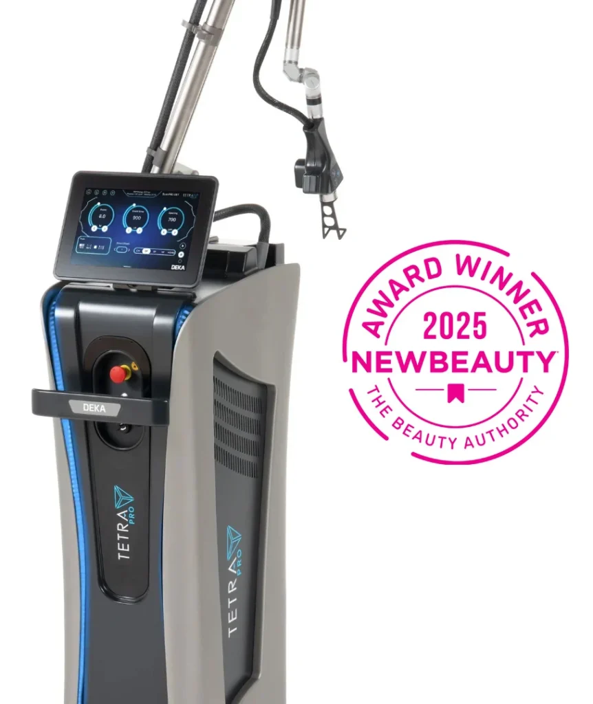 Tetra PRO CO₂ laser machine displayed alongside 2024 NewBeauty Award winner badge