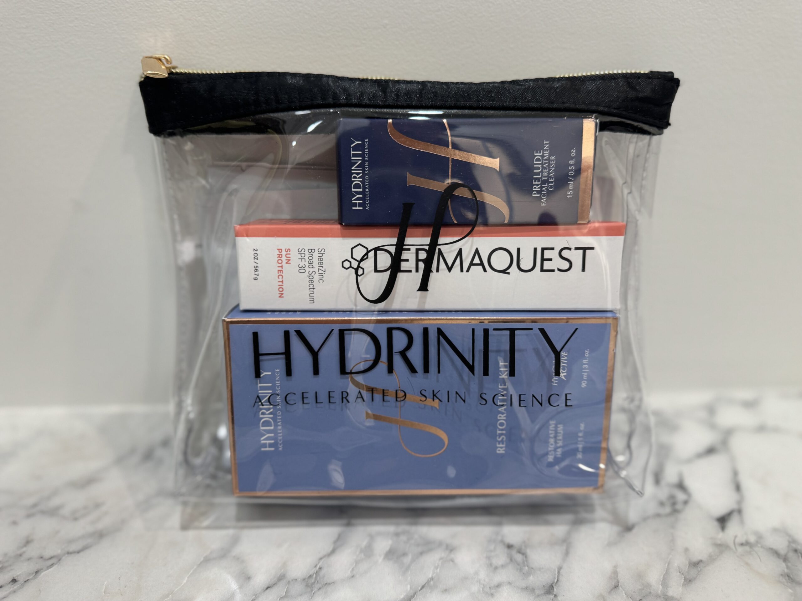 Hydrinity post-treatment skincare kit including DermaQuest SPF sunscreen for skin protection